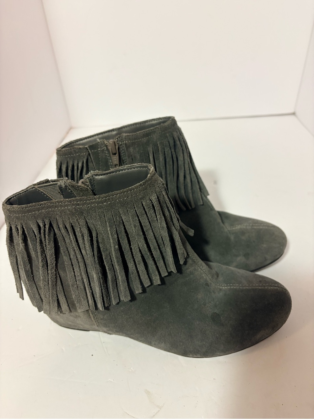 Comfortiva Fringe Suede Ankle Booties in Dark Gray